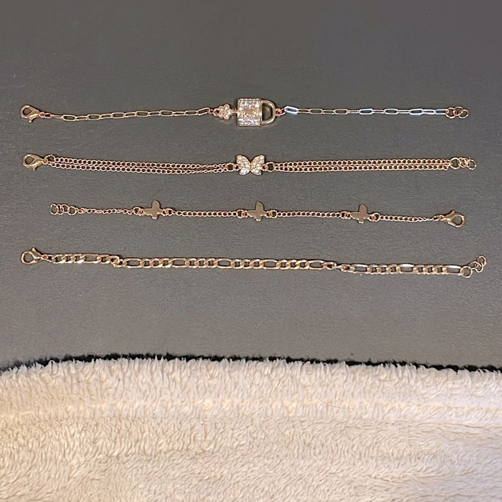 Forever 21 bracelets: lock, butterflies, and chain link